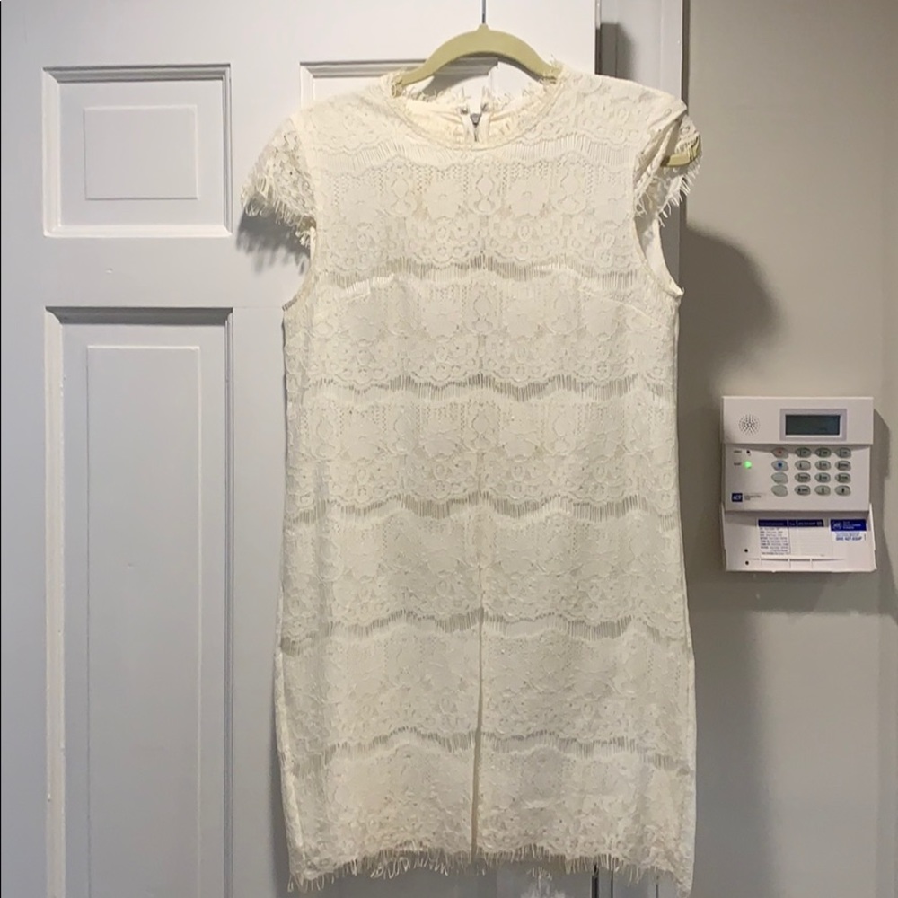 White dress with lace overlay